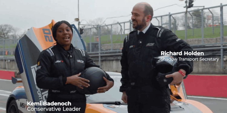 Kemi Badenoch and Ric Holden make a policy announcement - from inside a racing car