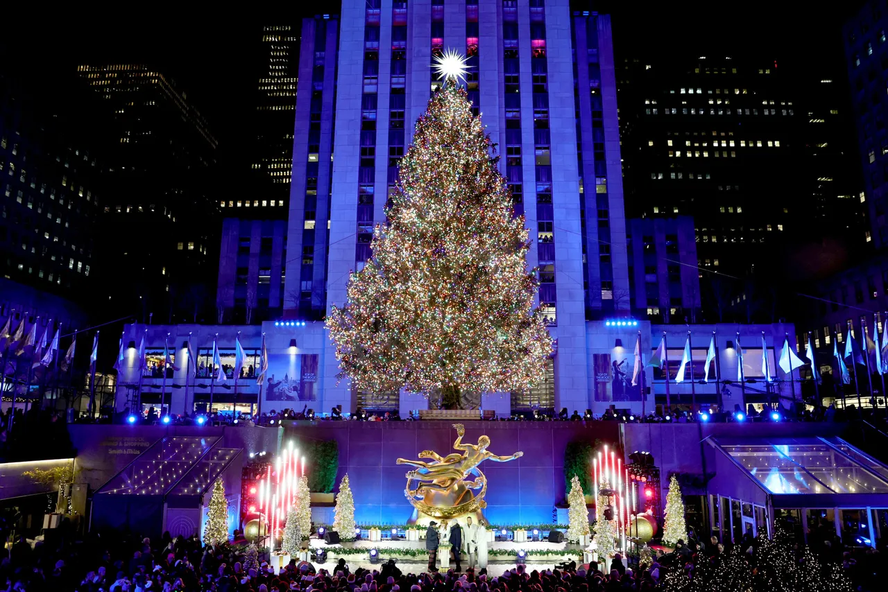 NEW YORK, NEW YORK - DECEMBER 03: A view of the lit tree during the 2025 Rockefeller Center Christmas Tree Lighting Ceremony on December 03, 2025 in New York City. (Photo by Theo Wargo/Getty Images)