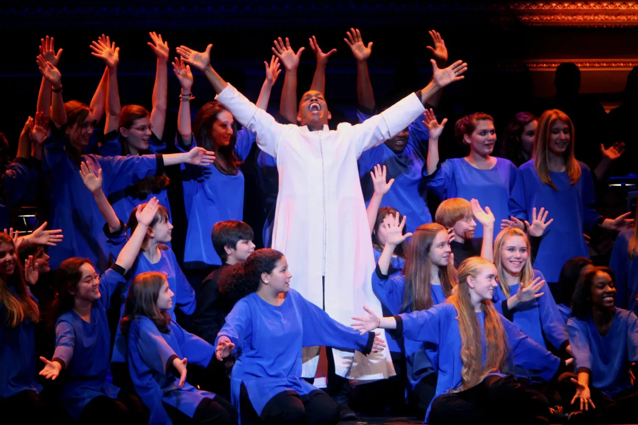 Baltimore Symphony Orchestra in Leonard Bernstein's "Mass" at Carnegie Hall on Friday night, October 24, 2008.The orchestra was joined by Street Chorus, Morgan State University Choir, Brooklyn Youth Chorus and Stony Brook University Marching Band.This image;Jubilant Sykes, in white, as Celebrant. (Photo by Hiroyuki Ito/Getty Images)