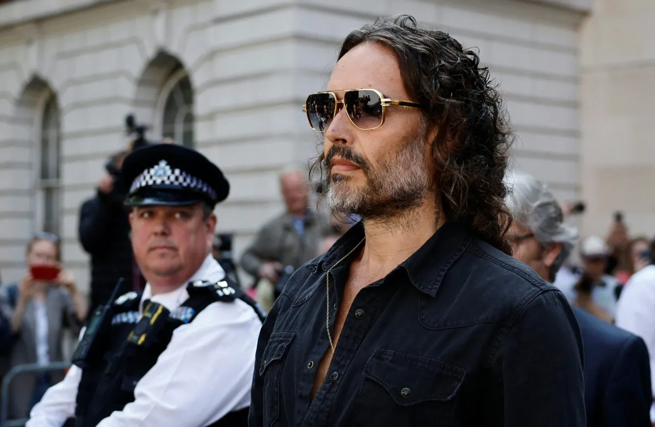 British actor and comedian Russell Brand departs Westminster Magistrates Court in London on May 2, 2025. British comedian and actor Russell Brand was on Friday bailed by a London court after he appeared to face five charges of rape and other sexual offences. (Photo by BENJAMIN CREMEL / AFP) (Photo by BENJAMIN CREMEL/AFP via Getty Images)
