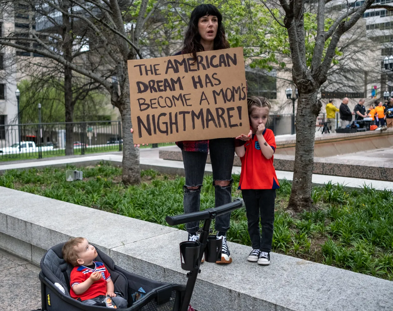 A mother and her children protest to gun control near the Tennessee State Capitol Building on April 3, 2023 in Nashville, Tennessee.