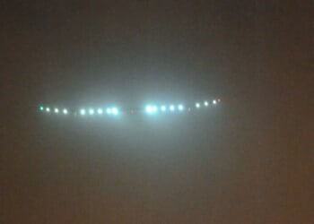 Triangular UFO Flies Over City In Eerie Video