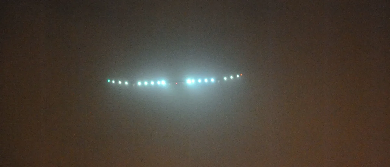 Triangular UFO Flies Over City In Eerie Video