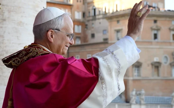 Pope Leo XIV greets the crowd gathered in St. Peter's Square after the announcement of his election on May 8, 2025. Credit: Vatican Media