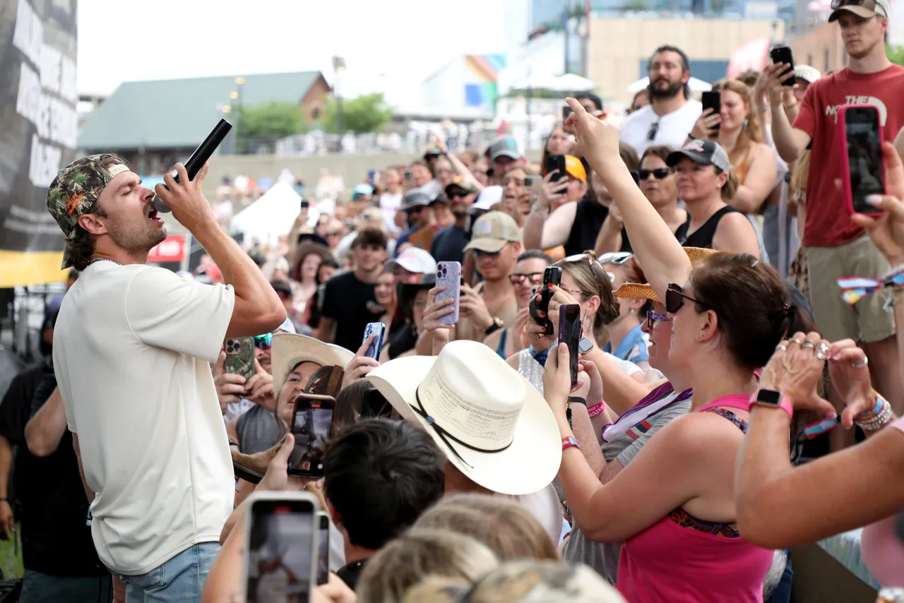 NASHVILLE, TENNESSEE - JUNE 07: EDITORIAL USE ONLY. Conner Smith performs on the Chevy Riverfront stage during day three of CMA Fest 2025 at Riverfront Park on June 07, 2025 in Nashville, Tennessee. (Photo by Danielle Del Valle/Getty Images)