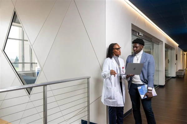 Ndidi Nwokorie, MBBS, FAAP, medical director of the Mount St. Mary’s physician assistant program, works one-on-one with a PA student. Credit: Photo courtesy of Mount St. Mary's University