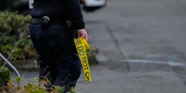 Authorities say federal immigration officer shoots and wounds 2 people in Portland, Oregon