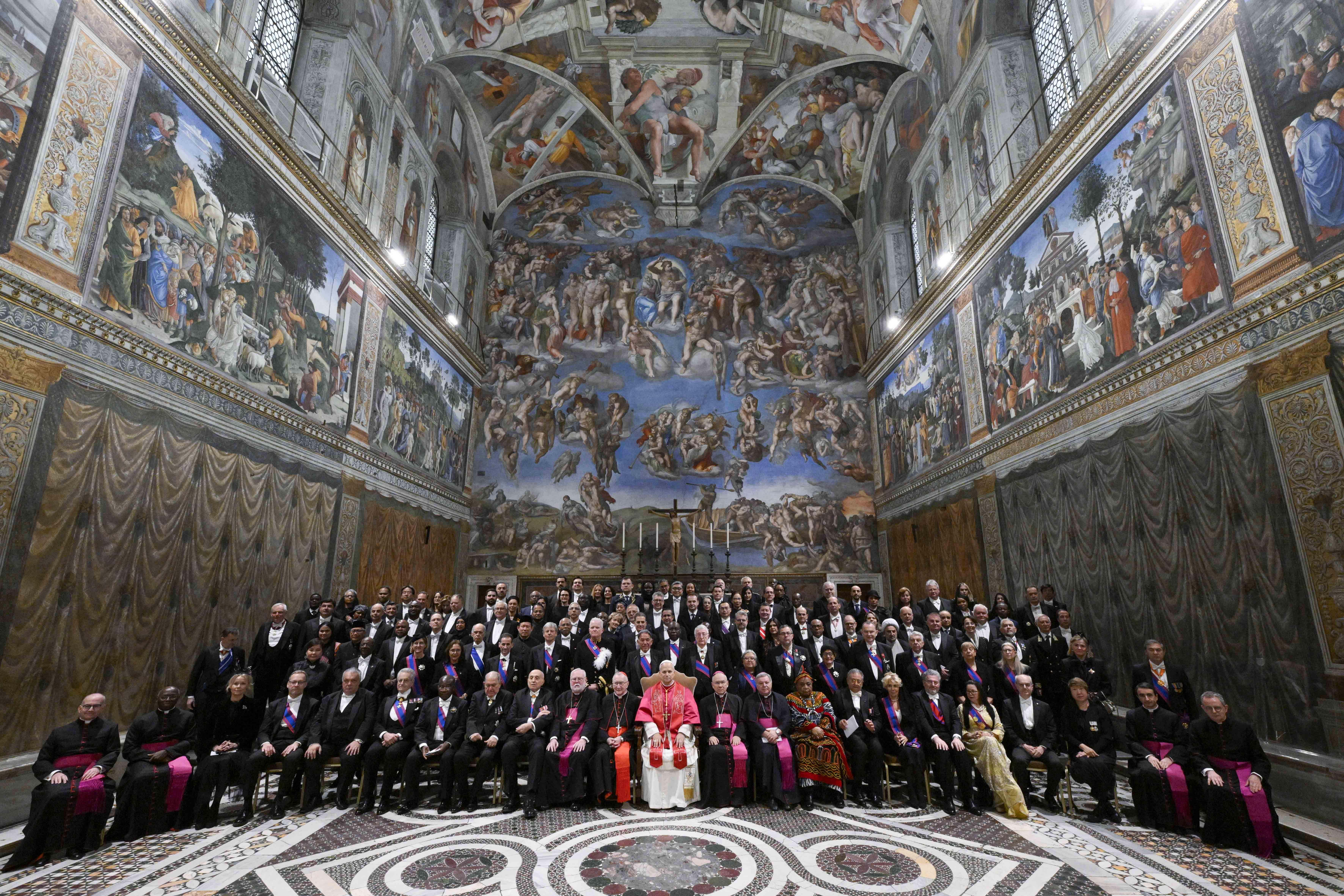 Pope Leo XIV poses with ambassadors and other diplomatic representatives to the Holy See in the Sistine Chapel on Jan. 9, 2026. | Credit: Vatican Media
