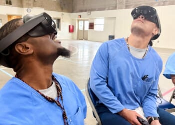 Virtual reality headsets offering escape and practical experience for California prisoners