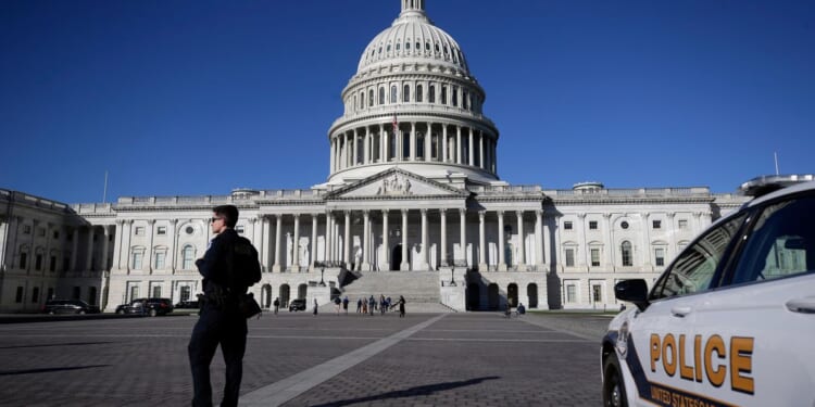 House staffer charged with swiping and pawning hundreds of government cell phones