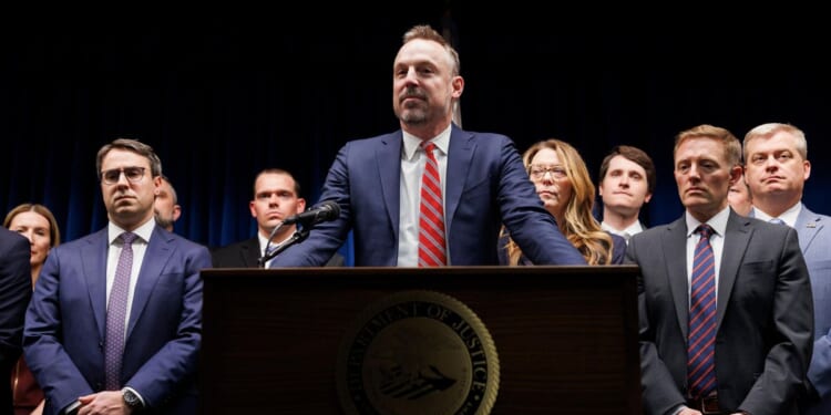 Official says Justice Department sees no basis for civil rights probe in Minnesota ICE shooting