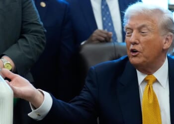 Glass bottle of milk gets a perch on Trump's desk but takes a back seat at bill signing