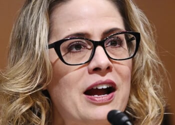 Former Sen. Kyrsten Sinema Had MDMA-Laced Affair With Her Married Security Guard, Lawsuit Alleges