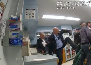 Prison guard accused of failing to step in during fatal inmate beating pleads to reduced charge