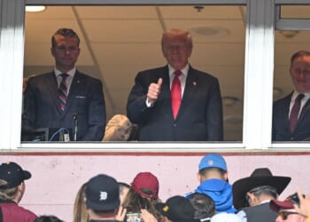 Trump cheered at college football title game
