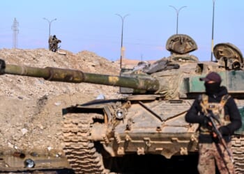 Syrian military says Kurdish guards abandoned IS-linked detainee camp