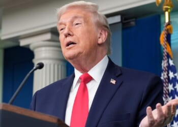 Trump boasts about his year-one record in surprise visit to White House briefing