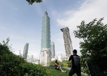 Climber's 'Skyscraper Live' ascent of 1,667-foot tower in Taiwan delayed by rain