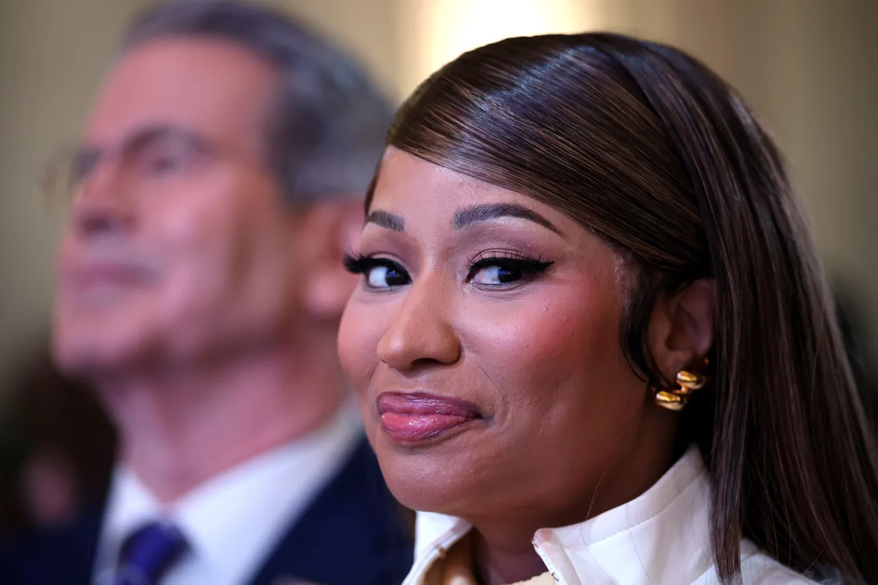 WASHINGTON, DC - JANUARY 28: Musician Nicki Minaj attends the Treasury Department's Trump Accounts Summit at Andrew W. Mellon Auditorium on January 28, 2026 in Washington, DC. "Trump Accounts" are a portion of recently passed tax and spending legislation where the federal government will deposit $1,000 into investment accounts for every child born between 2025 and 2028 once parents sign their children up while filing their income taxes.  (Photo by Win McNamee/Getty Images)