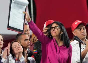 Venezuela's acting president signs oil industry overhaul to lure investors