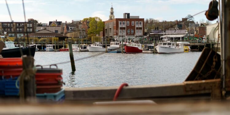 State senator says missing fishing boat was carrying seven people when it sank off Massachusetts