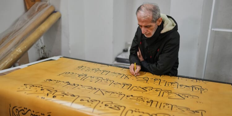 Iraqi calligrapher Ali Zaman's handwritten Quran ends 6 years of artistry and craft