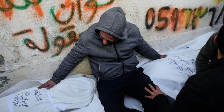 Israeli strikes kill 30 Palestinians, including children, as Gaza ceasefire moves forward