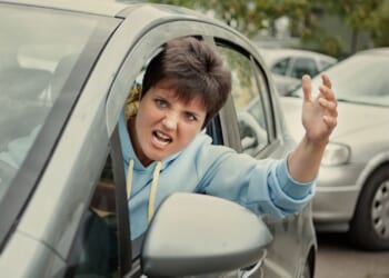 Anti-ICE Karen Gets Dragged Out of Her Car as Tensions Escalate in Minneapolis [WATCH]