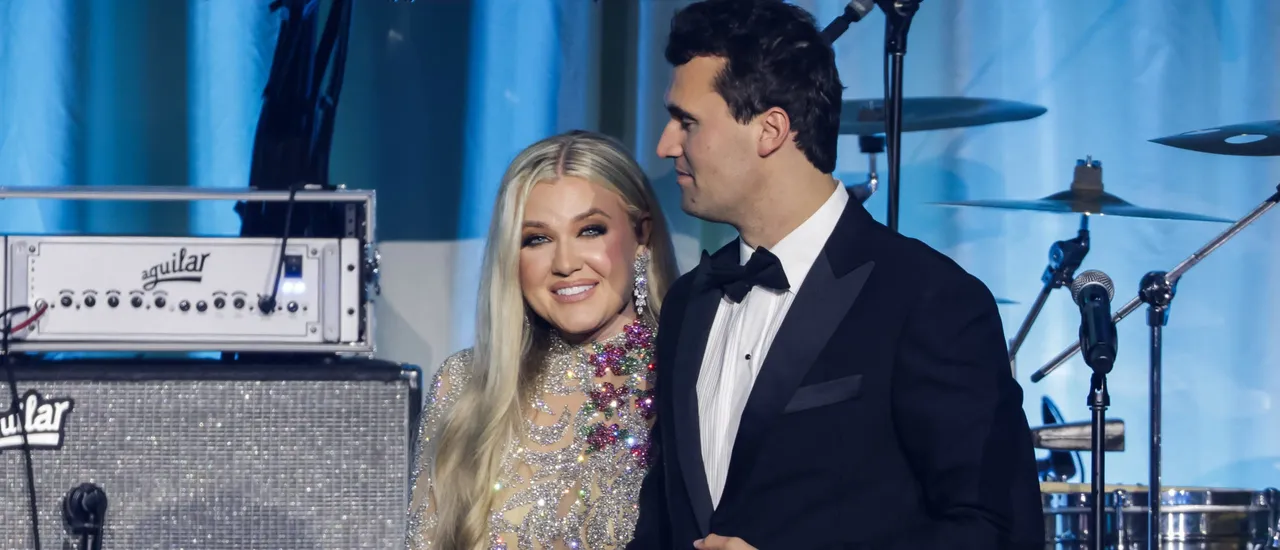 WASHINGTON, DC - JANUARY 19: Charlie Kirk (R) and and his wife Erika Lane Frantzve (L) on stage during the Turning Point USA Inaugural-Eve Ball at the Salamander Hotel on January 19, 2025 in Washington, DC. (Photo by Samuel Corum/Getty Images)