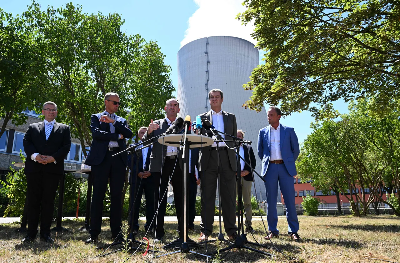 eader of Germany's Christian Democratic Union Friedrich Merz, Bavaria's Minister for Economy Hubert Aiwanger and Bavaria's State Premier Markus Soeder give a press conference after their visit of the Isar Nuclear Power Plant in Essenbach, southern Germany, on August 4, 2022.