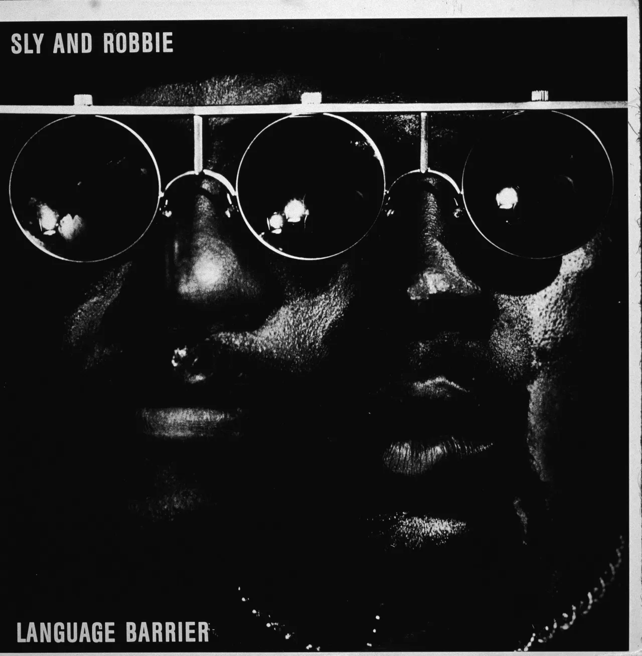 Jamaican reggae musicians Sly and Robbie's 'Language Barrier' album cover, featuring drummer Sly Dunbar and bassist Robbie Shakespeare, 1985. (Photo by Blank Archives/Getty Images)