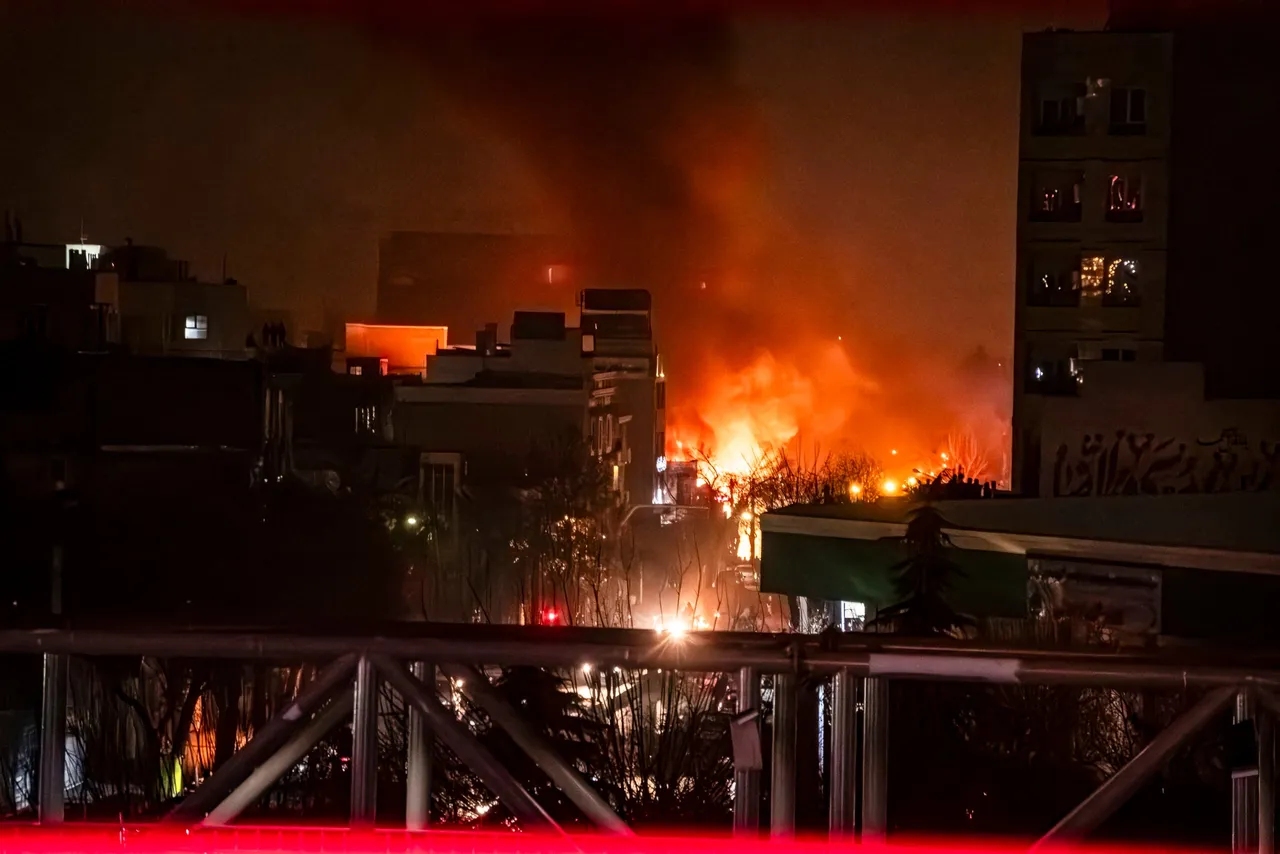 Iranians gather while blocking a street during a protest in Tehran, Iran on January 9, 2026. (Photo by Khoshiran / Middle East Images / AFP via Getty Images)