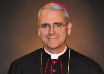 President Donald Trump meets with Archbishop Paul Coakley
