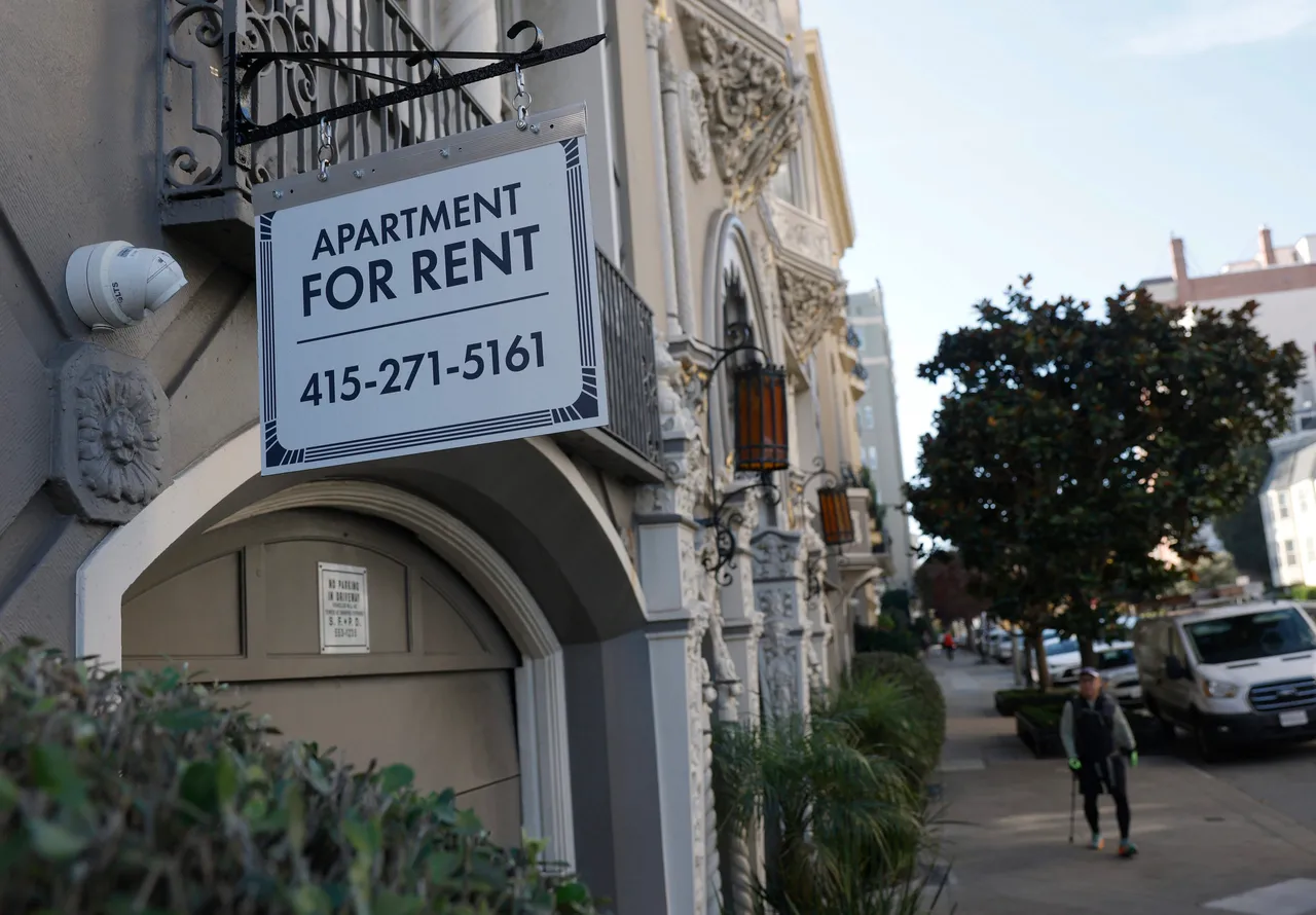 An apartment for rent sign hangs outside of an apartment building on December 04, 2025 in San Francisco, California. (Photo by Justin Sullivan/Getty Images)