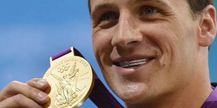 Three Of Ryan Lochte’s Olympic Gold Medals Sell For Over $385,000 At Goldin Auction