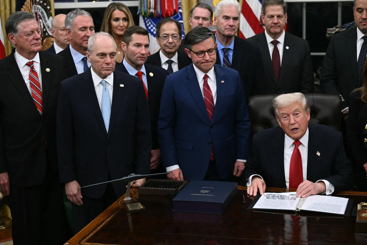 US President Donald Trump (R) speaks as the Speaker of the House Mike Johnson (C) and the House Majority Leader Steve Scalise (2nd L), both Republicans of Louisiana, look on while signing the bill package to open the federal government in the Oval Office of the White House in Washington, DC, on November 12, 2025. (Photo by BRENDAN SMIALOWSKI/AFP via Getty Images)