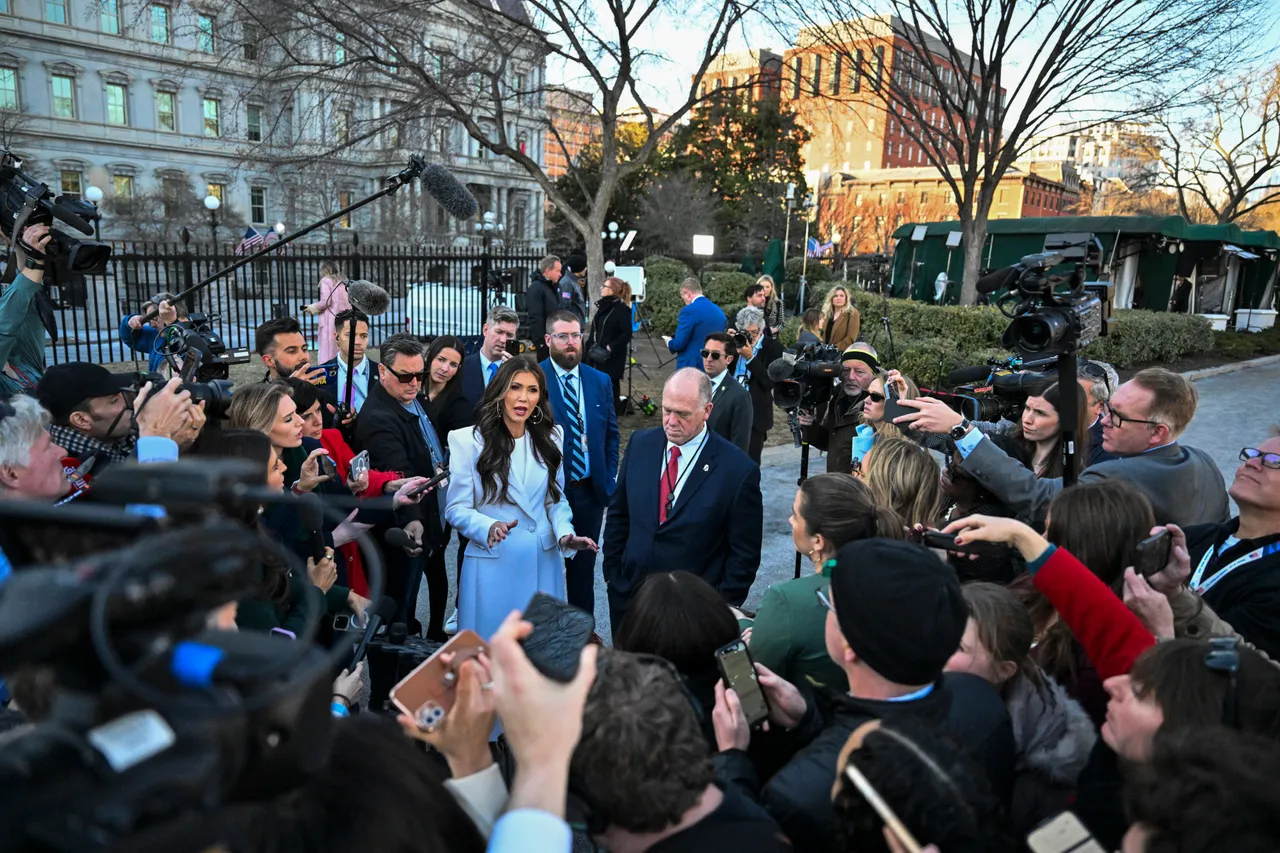US Secretary of Homeland Security Kristi Noem (C-L) and White House 'border czar' Tom Homan (C-R) speak to the press outside the White House in Washington, DC, on January 29, 2025. (Photo by ROBERTO SCHMIDT / AFP) (Photo by ROBERTO SCHMIDT/AFP via Getty Images)