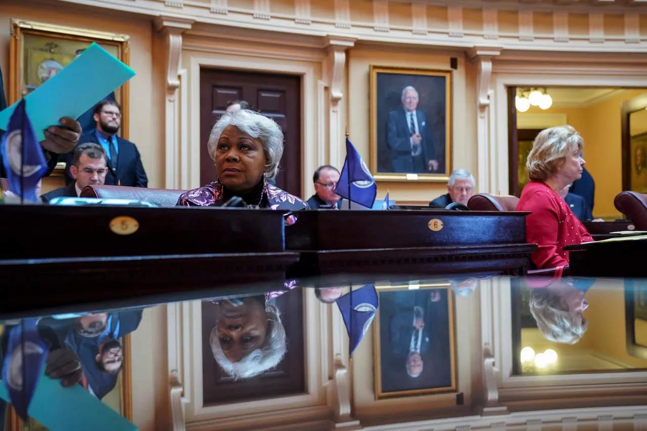 L. Louise Lucas (C), Democrats and longtime member of the Virginia Legislative Black Caucus, listens to the proceedings. (Photo by Drew Angerer/Getty Images)