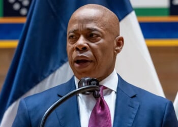 Watch Eric Adams Drop Profanity, Clash With Airline Passenger