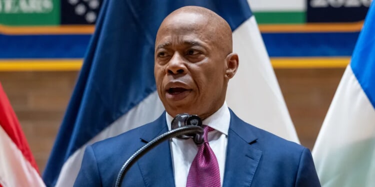 Watch Eric Adams Drop Profanity, Clash With Airline Passenger