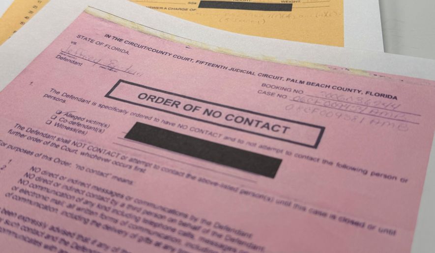 An email that was included in the U.S. Department of Justice release of the Jeffrey Epstein files is photographed Friday, Jan. 30, 2026, and shows a 2009 order of no contact in Palm Beach, Fla. (AP Photo/Jon Elswick)