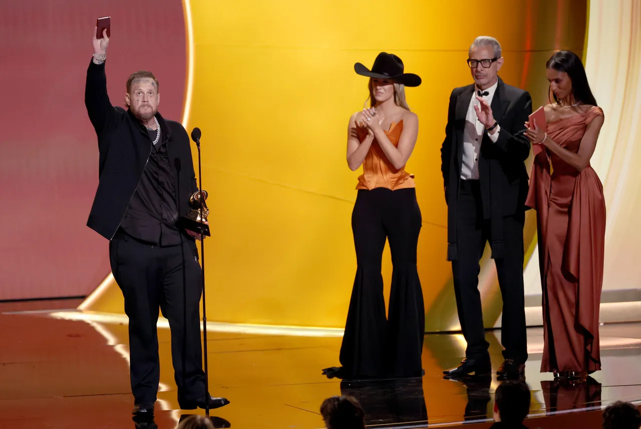 LOS ANGELES, CALIFORNIA - FEBRUARY 01: (FOR EDITORIAL USE ONLY) Jelly Roll accepts the Best Contemporary Country Album award for 