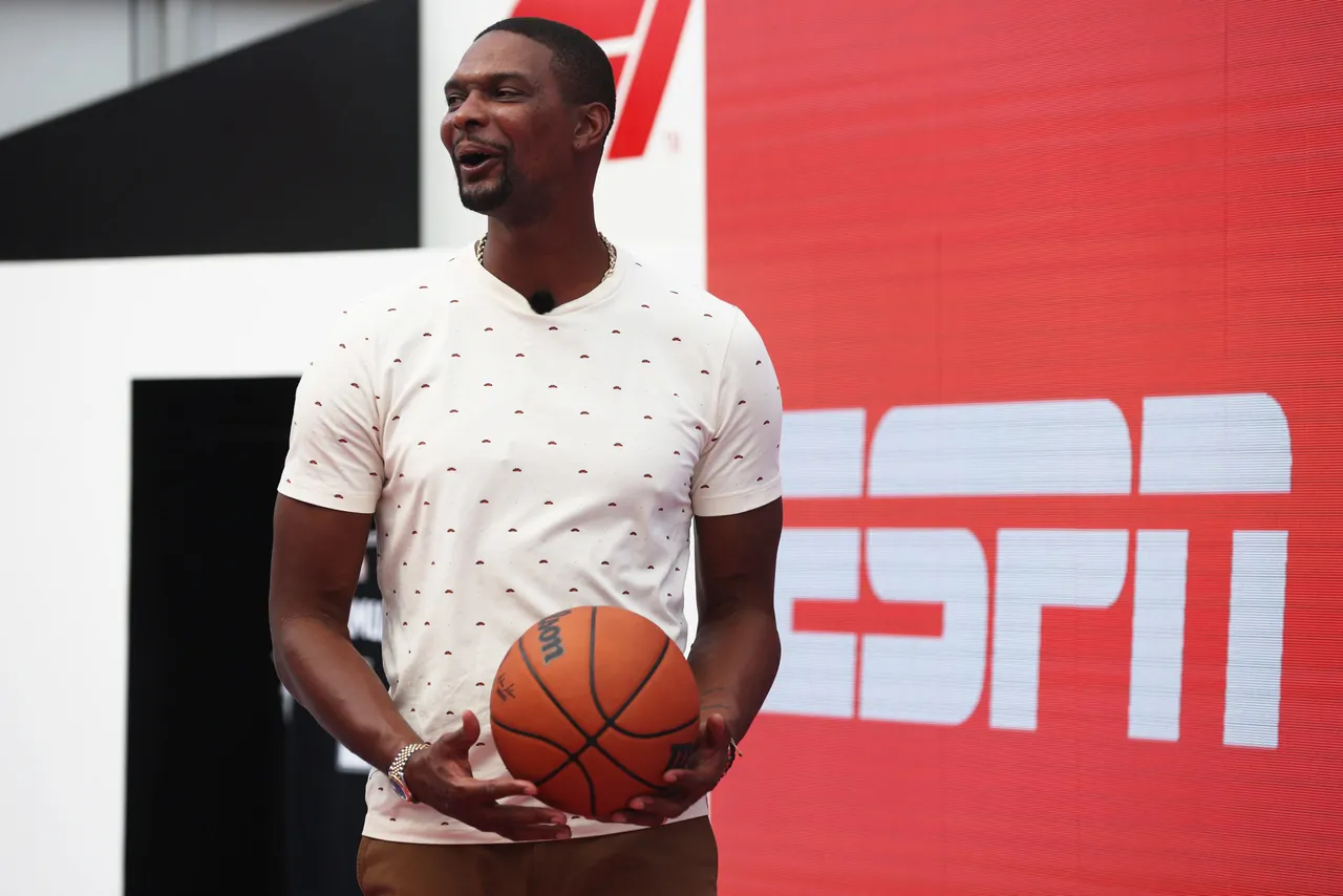 AUSTIN, TEXAS - OCTOBER 21: NBA legend Chris Bosh looks on in the Paddock during previews ahead of the F1 Grand Prix of USA at Circuit of The Americas on October 21, 2021 in Austin, Texas. (Photo by Chris Graythen/Getty Images)