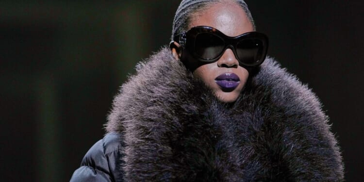 Kate Moss closes Demna's 1st Gucci show in a plunging gown and branded thong