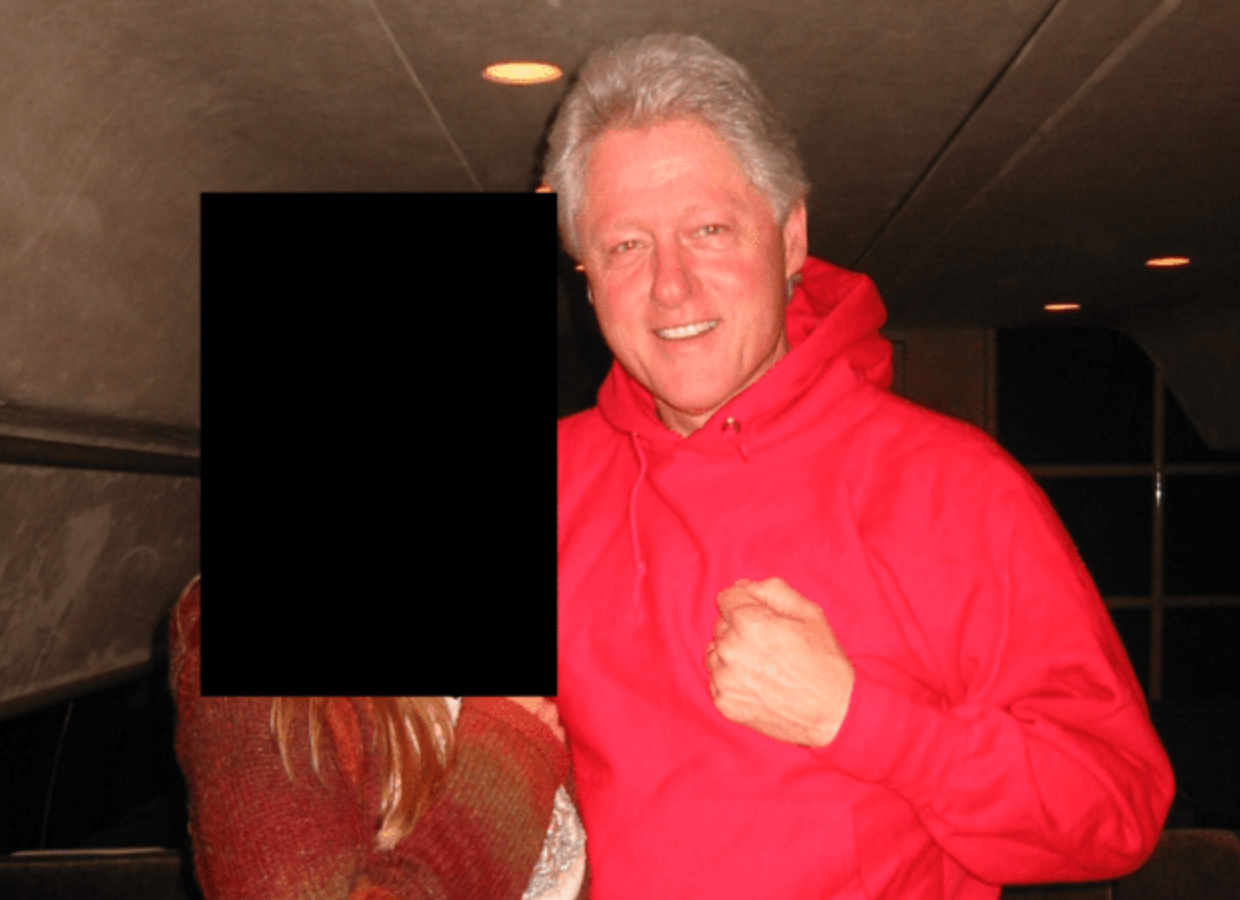 Department of Justice photo with Bill Clinton and an unidentified woman