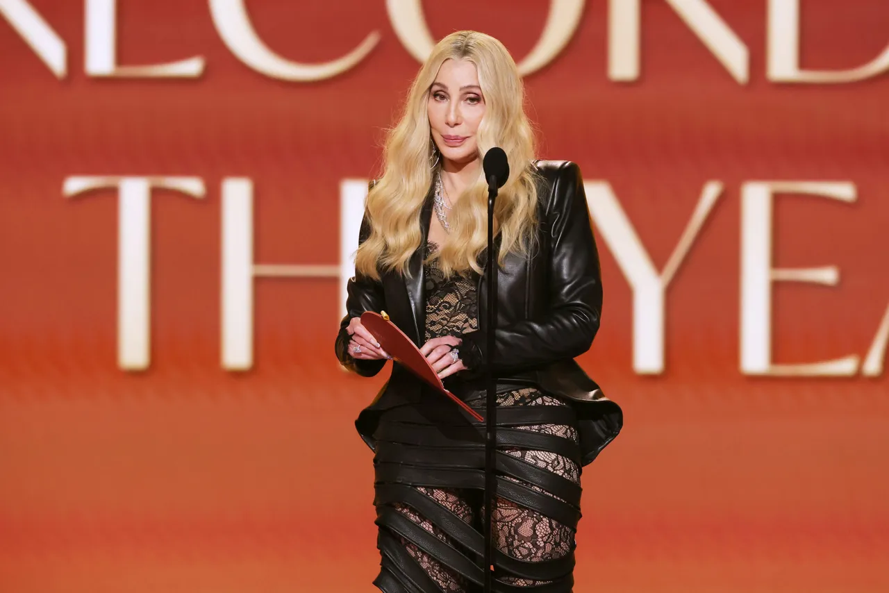 LOS ANGELES, CALIFORNIA - FEBRUARY 01: Cher speaks onstage during the 68th GRAMMY Awards at Crypto.com Arena on February 01, 2026 in Los Angeles, California. (Photo by Kevin Winter/Getty Images for The Recording Academy)