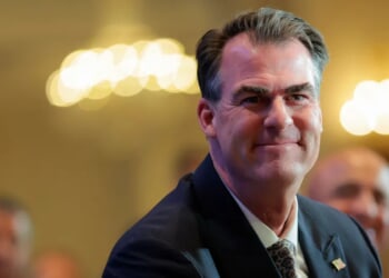 GOP Gov. Kevin Stitt Says Democrats Aren’t Trying To Turn Illegals Into Voters