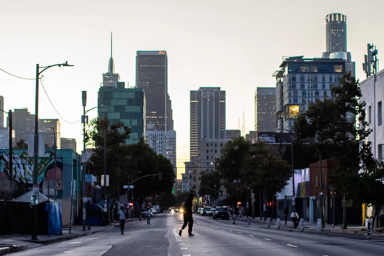 JULY 25: A homeless man walks on the street in Skid Row on July 25, 2025. (Photo by Apu Gomes/Getty Images)