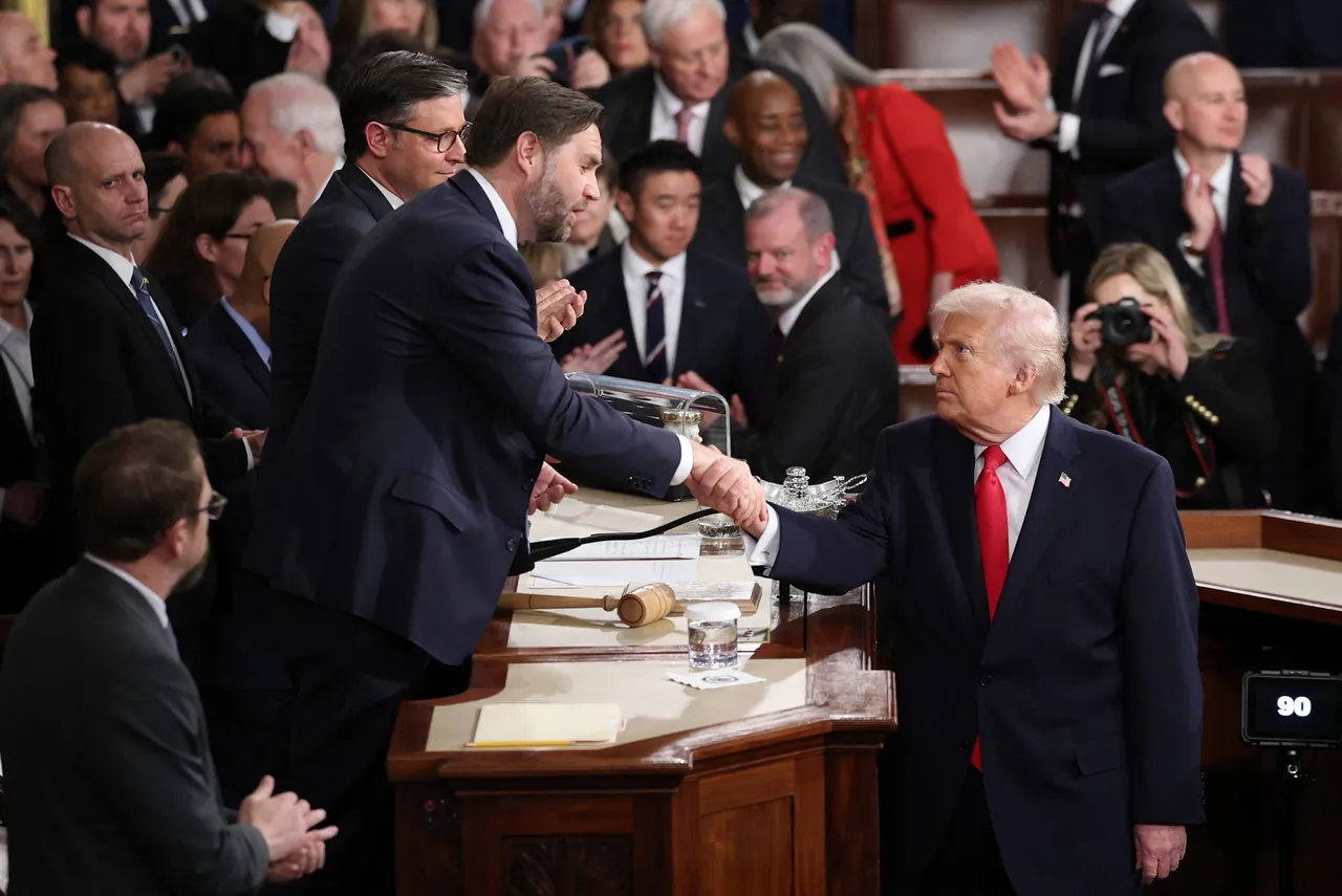 U.S. President Donald Trump shakes hands with his Vice President JD Vance after his State of the Union address during a Joint Session of Congress at the U.S. Capitol on February 24, 2026, in Washington, DC. Trump delivered his address days after the Supreme Court struck down the administration's tariff strategy and amid a U.S. military buildup in the Persian Gulf threatening Iran. (Photo by Win McNamee/Getty Images)