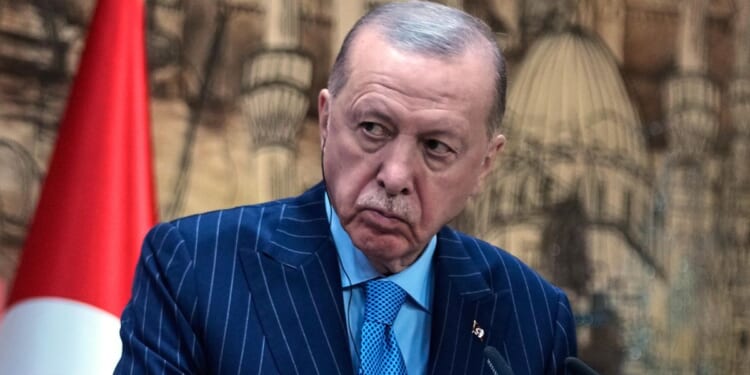 Turkey says NATO air defenses shot down an Iranian drone approaching its territory